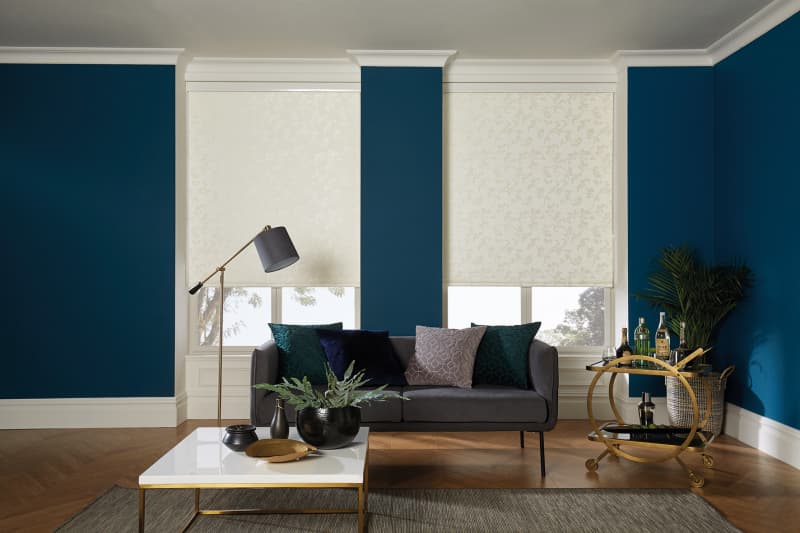 Blue lounge with white roller blinds