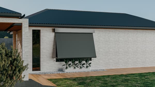 Auto lock arm awning installed on a home, providing shade and protection with a sleek, modern design.