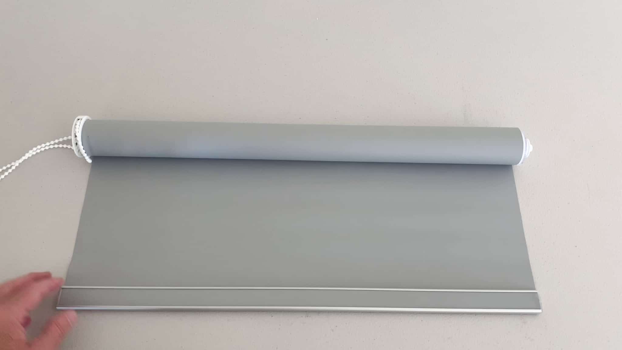 change standard roller blind from back to front