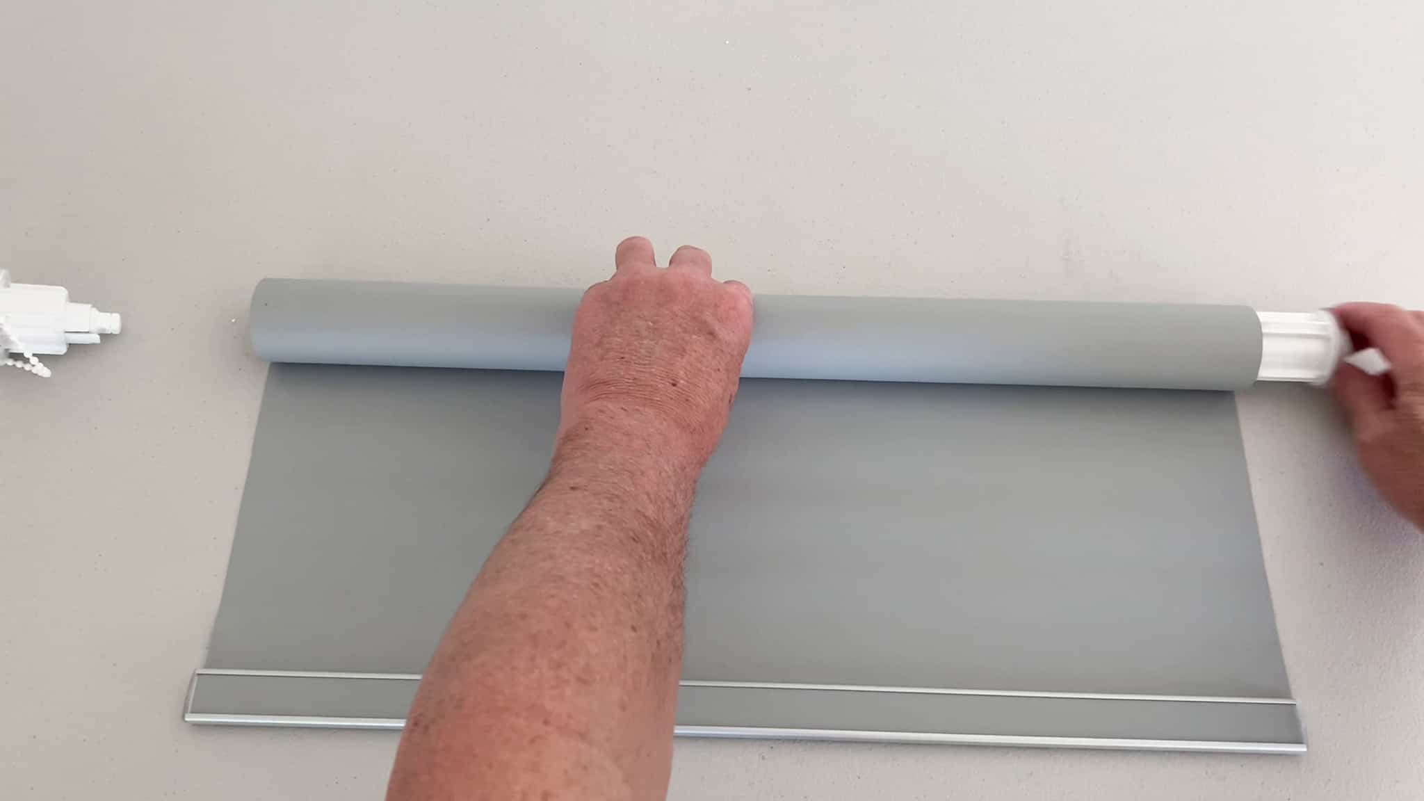 change standard roller blind from back to front