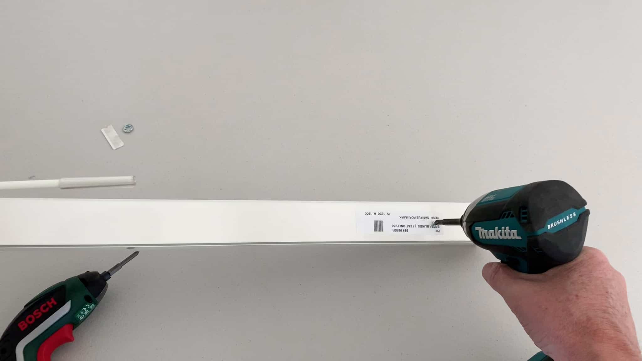 remove vertical blind screw