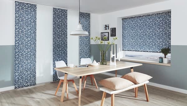 blue floral pattern panel glide blinds in dining room