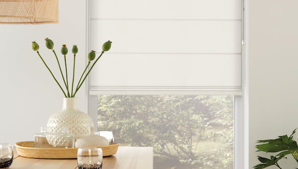 white roman blind in office